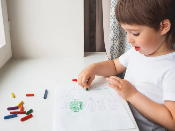 Toddler Draws Funny Robot Kid Uses Wax Crayons Smiling Boy — Stock Photo, Image