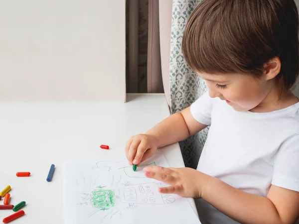 Toddler Draws Funny Robot Kid Uses Wax Crayons Smiling Boy — Stock Photo, Image