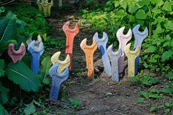 Installation Multi Colored Spanners Buried Ground Garden — Stock Photo, Image