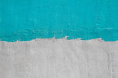 Arka plan olarak renkli (gri ve turkuaz) beton duvar, doku