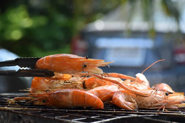Fresh shrimp grilled on the flaming grill. seafood