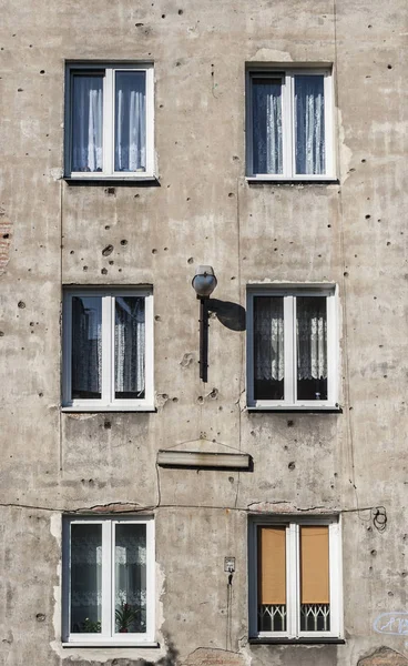 Building with marks of shots — Stock Photo, Image