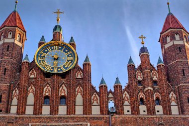 Clock on gothic church in Gdansk clipart
