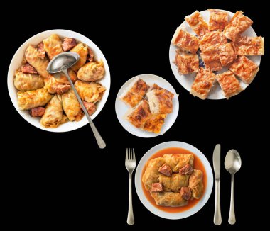 Yerli turşu lahana rulo siyah arka plan üzerine izole geleneksel buruşuk peynir pasta ile servis