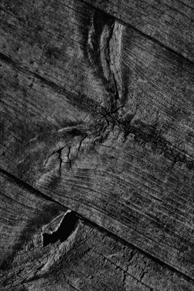 Negro viejo envejecido podrido agrietado anudado áspero madera de pino suelo grunge superficie textura detalle — Foto de Stock