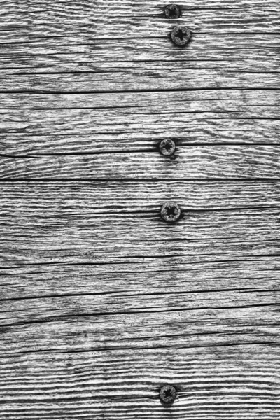 Mid Gray Old Weathered Cracked Knotted Pine Wood Floorboards With Rusty Phillips Screws Embedded Detail — Stock Photo, Image