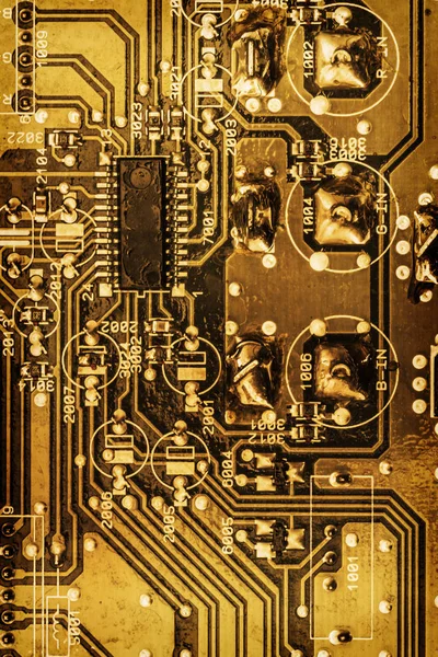 Microcircuit μητρική πλακέτα χρυσό χρωματιστό λεπτομέρεια σκηνή φόντο — Φωτογραφία Αρχείου