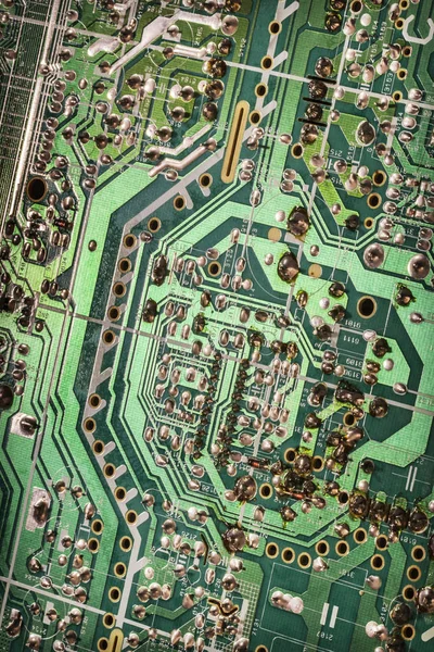 Bilgisayar elektronik mikrodevre anakart detay yeşil vinyet arka plan — Stok fotoğraf