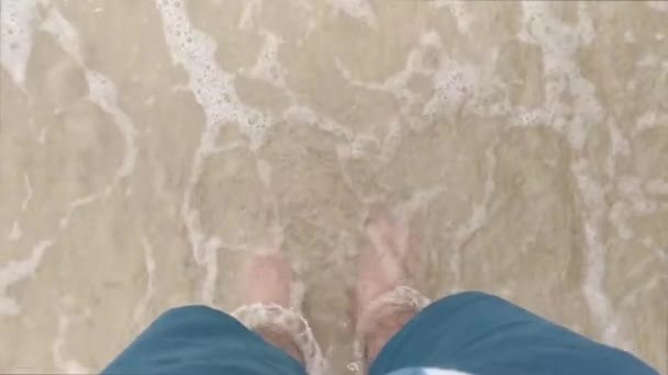 Man Feet Washed Ocean Waves Buries Them Sand — Stock Video