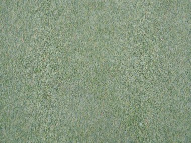 Yeşil suni çim futbol sahası. (Arka plan görüntüsü için kullanılan ya da tasarım iş)