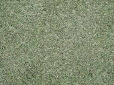 Yeşil suni çim futbol sahası. (Arka plan görüntüsü için kullanılan ya da tasarım iş)