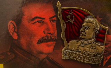 MOSCOW, RUSSIA - NOVEMBER 30, 2016: icon with the image of Generalissimo Josef Stalin is on the cover of the book with his image clipart