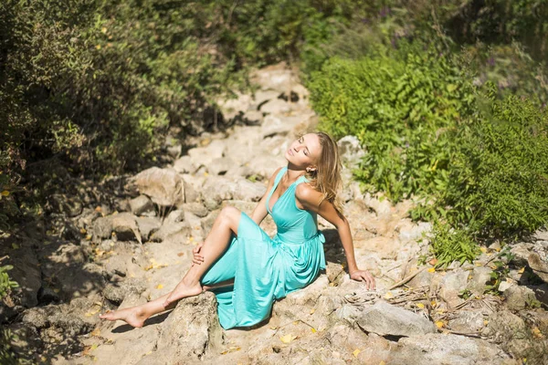 Blond Woman Wearing Long Blue Dress Dry Stones Mountain River — Stock Photo, Image