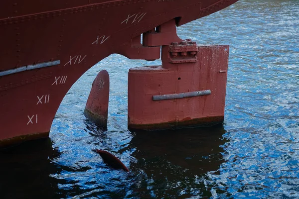 Fan at the back of a boat. propeller of a ship inside water.