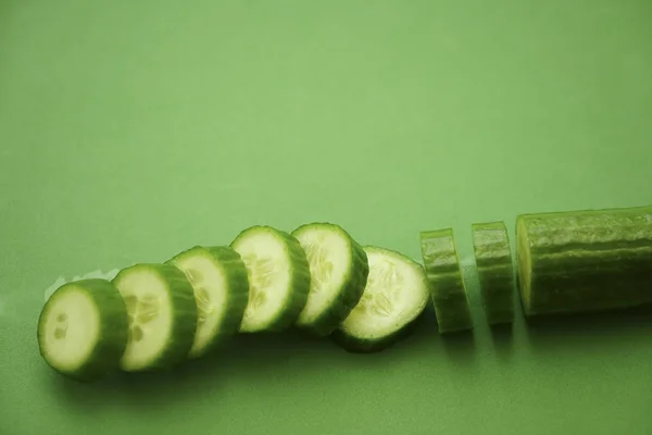 Fresh Cucumber Slices Green Background — Stock Photo, Image