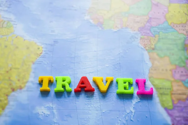 Word Travel Made Colorful Letters World Map Background — 스톡 사진