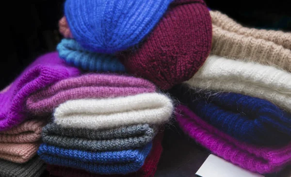 Beautiful background knitting.   handmade hats