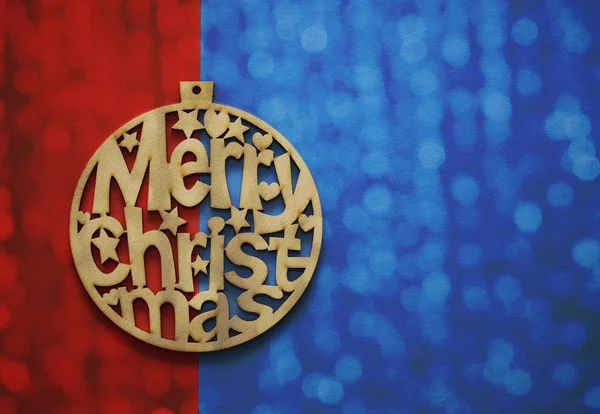 木制圣诞节托恩红色和蓝色纸背景 圣诞快乐题词 — 图库照片