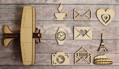 wooden figures on  travel theme on wooden background