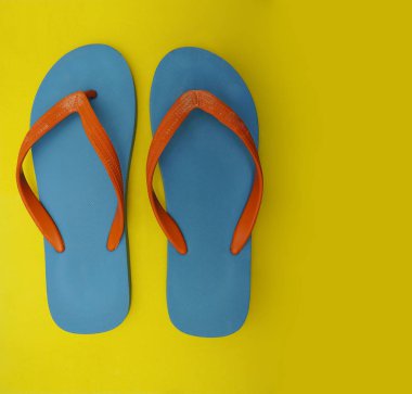 Görüntü colorfu - turuncu ve mavi sarı bir arka plan üzerinde izole floplar flip