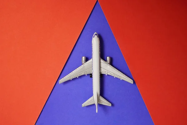 Metal Toy Airplane Red Blue Paper Background Travel Transportation Idea — Stock Photo, Image