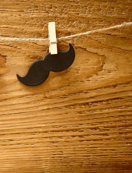 Black Mustache Handing Rope Wooden Pin Wood Board Background Happy — Stock Photo, Image