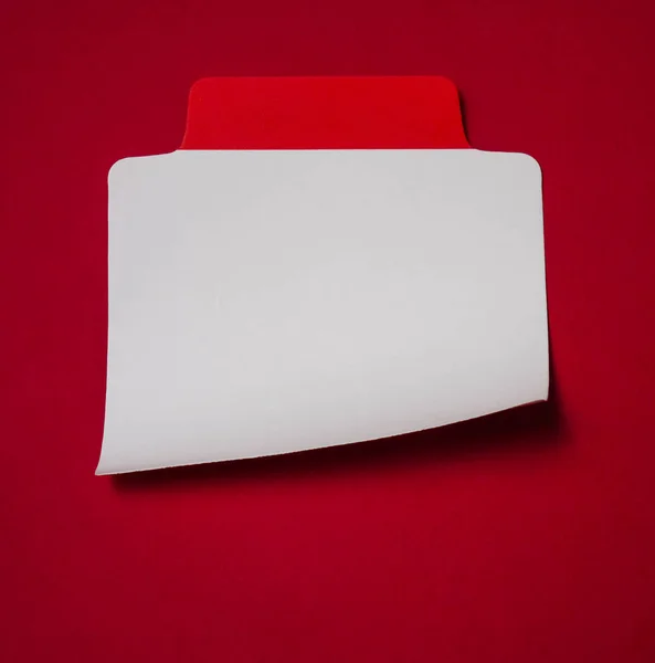 Colorful red and white paper tag. red banner background.