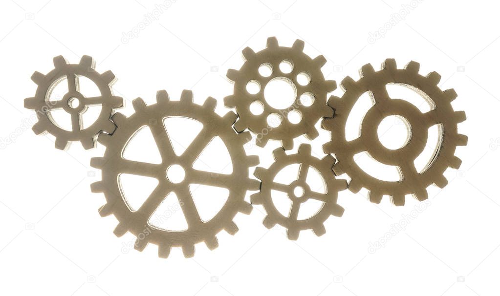  wooden cogs isolated on white background.