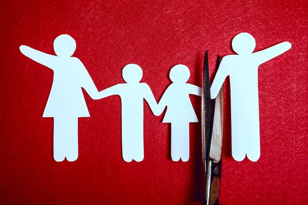 Scissors Dividing Whole Family Divorce Idea Wooden Figures Red Background — Stock Photo, Image
