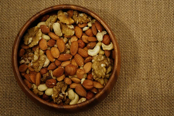 Mixed nuts. Walnuts, Brazil nuts, almonds, hazelnuts. Concept of Healthy Eating.