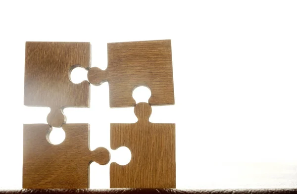 Quattro Pezzi Puzzle Legno Sfondo Bianco Concetto Connessione Persone — Foto Stock