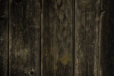 Zemin veya düz yüzey üzerinde ahşap panoları ile koyu rustik ahşap arka plan. 