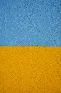 Turuncu ve mavi duvar dokusuarka plan. Sarı mavi duvar deseni arka plan. duvar arka plan. Soyut grunge arka plan. ukrayna bayrağı. 