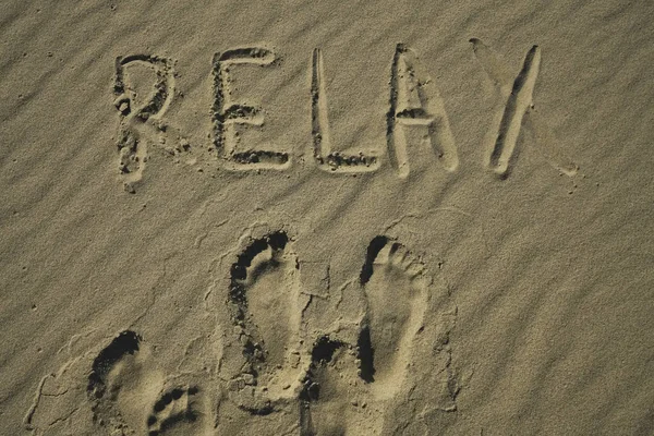 Palavra Relaxe Praia Areia — Fotografia de Stock