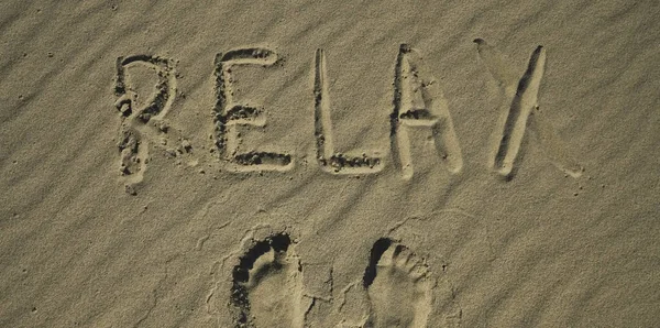 Palavra Relaxe Praia Areia — Fotografia de Stock