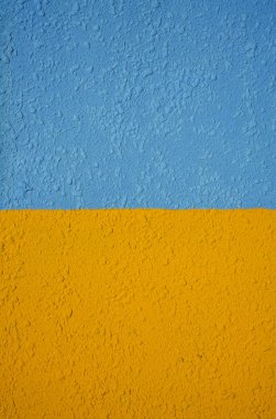 Turuncu ve mavi duvar dokusuarka plan. Sarı mavi duvar deseni arka plan. duvar arka plan. Soyut grunge arka plan. ukrayna bayrağı. 