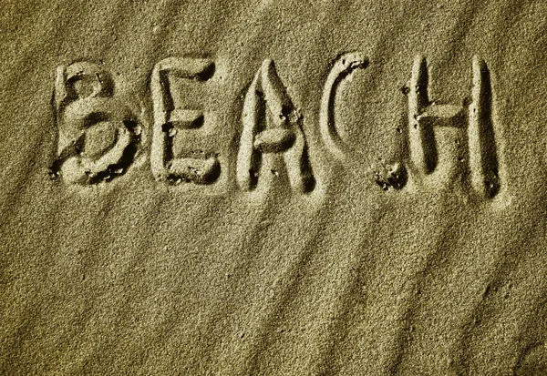 Inscrição Areia Praia Palavra Praia Está Escrita Areia Mão Temporada — Fotografia de Stock