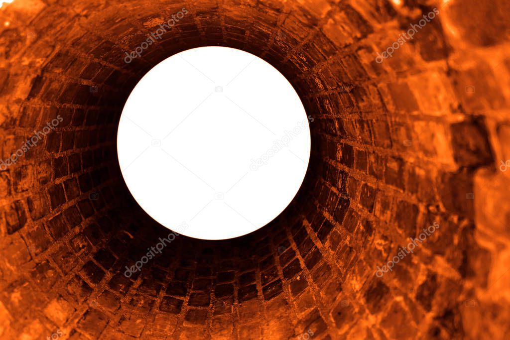  top view of red bricks sewer pit / inside in access pit / canalization hole. Inside old red brick tube shaft