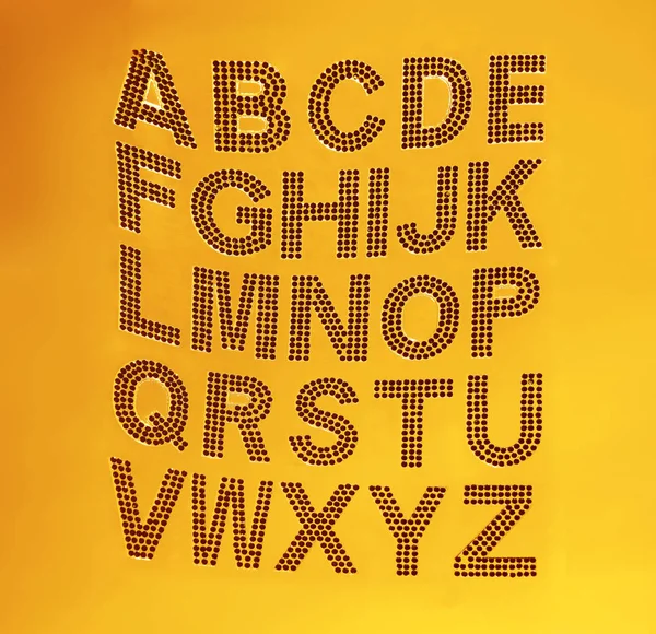 Set Alphabet Anglais Des Strass Verts Sur Fond Ciel Jaune — Photo