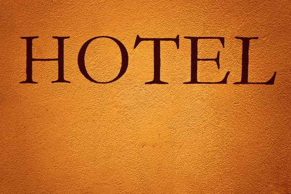 Skriv Lyxhotell Detalj Hotell Hotel Sign Byggnad Vägg Gul Ton — Stockfoto