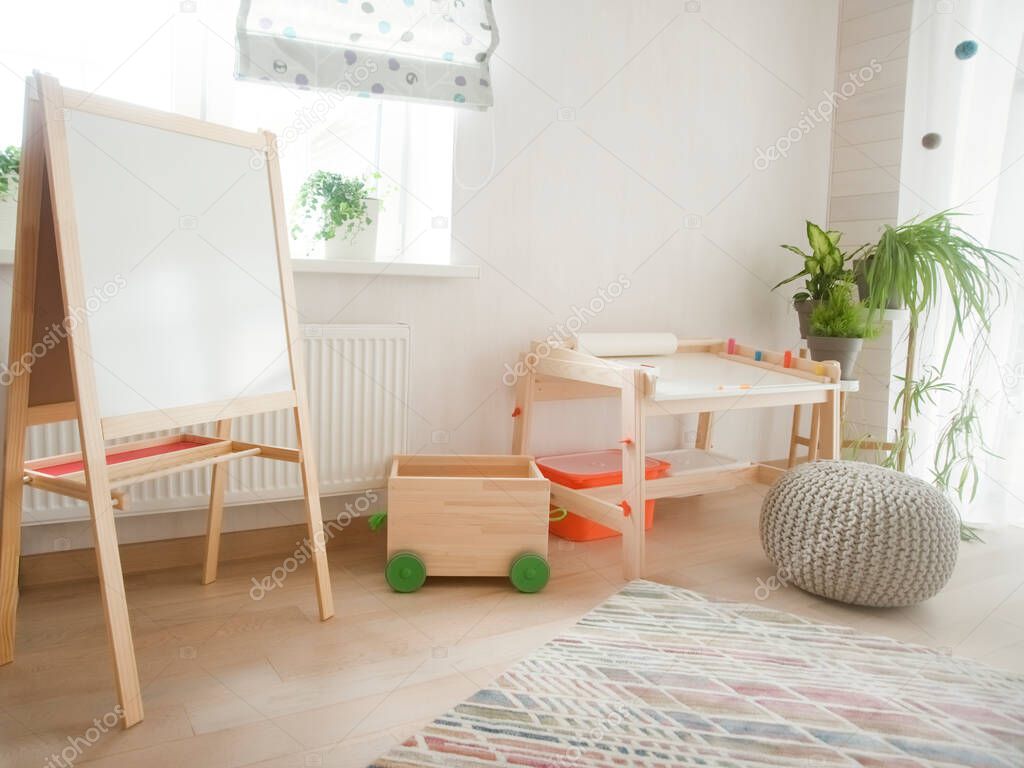 Kindergarten room with stool  and table for painting. children's room and furniture 