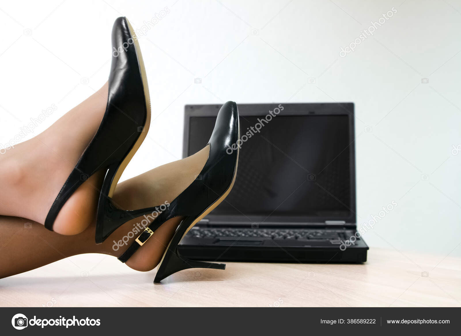 Female Legs High Heels Table Laptop Empty Screen Face Womans