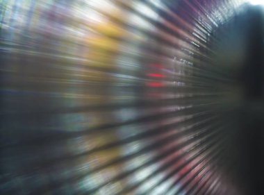 Bulanık görüntü. Soyut parlayan turkuaz. Renkli ışıklar arasında hareket