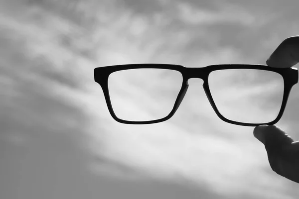 Hipster Male Hand Hold Glasses Glass Cloudy Sky Background — Stock Photo, Image