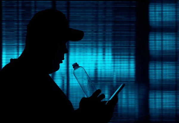 Silhouette Man Drinking Plastic Bottle Shot Transparent Glass Using Mobile — Stok fotoğraf