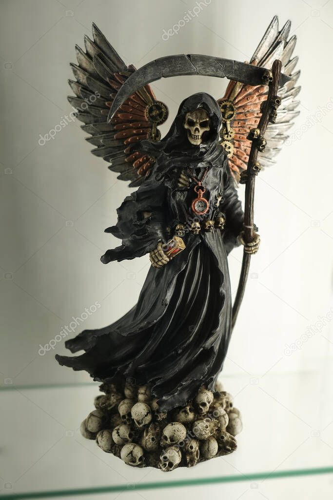 Grim Reaper holding hourglass.Death grim Reaper skeleton wearing a black robe and wielding a scythe, Memento Mori,  Epidemic Pandemic Time 