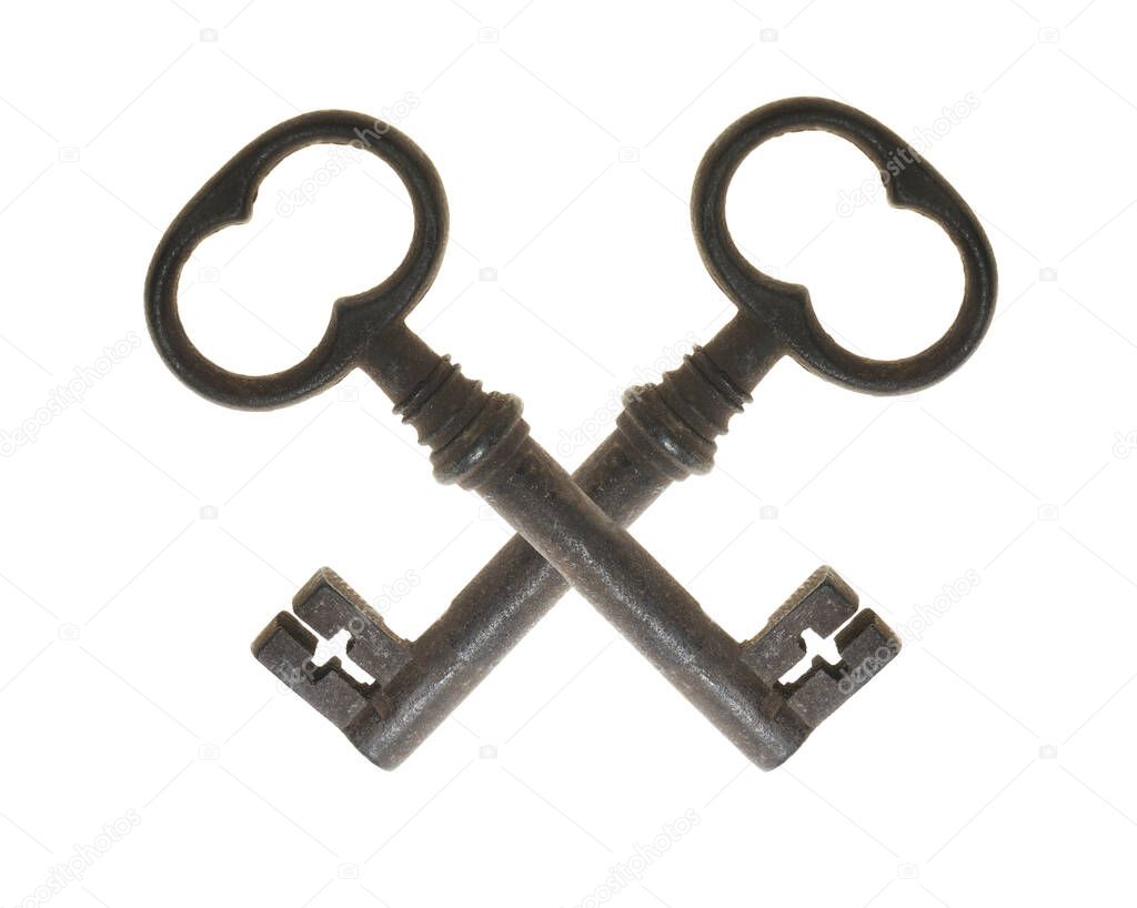Two crossed retro keys isolated on white background. Metal,  rusty door keys crossed.  symbol, coat of arms of Vatican papal state -  two crossed keys. the keys to paradise of the apostle Peter