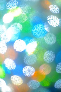 Soyut renkli kabarcıklar. Renk çemberli bayram arkaplanı. Renk ışıkları arka planı bulanıklaştırır