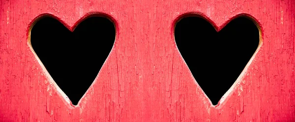 Red Wooden Door Two Black Hearts Hearts Carved Wooden Board — Stock Photo, Image