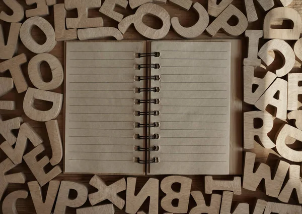 Empty Blank Letter.  Flat Lay. Top View.Studying college university high-school writing concept. Top above overhead view photo of blank open notebook .letters background